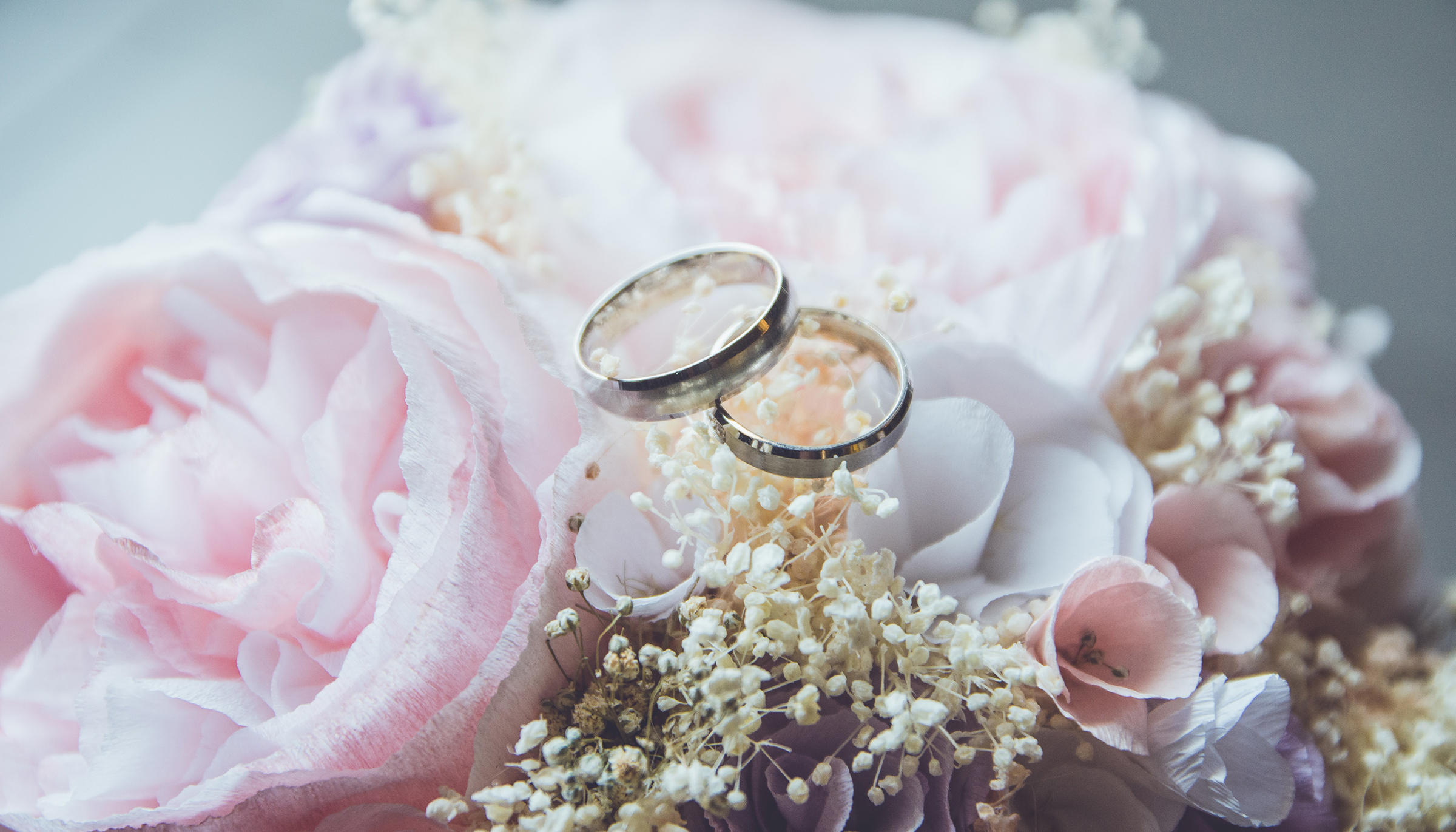 wedding rings and flowers